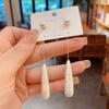 Cotton pearl fringed earrings fashion niche stud earrings personality exaggerated earrings