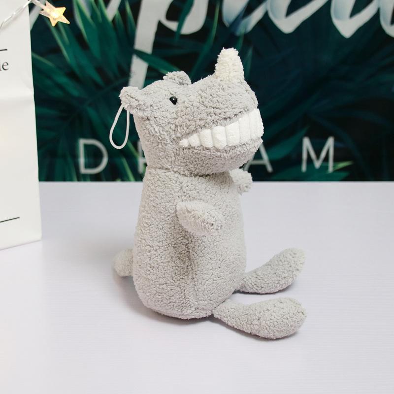The same smiling big tooth doll, creative plush toy with hand gift, grab machine doll, throw cloth doll