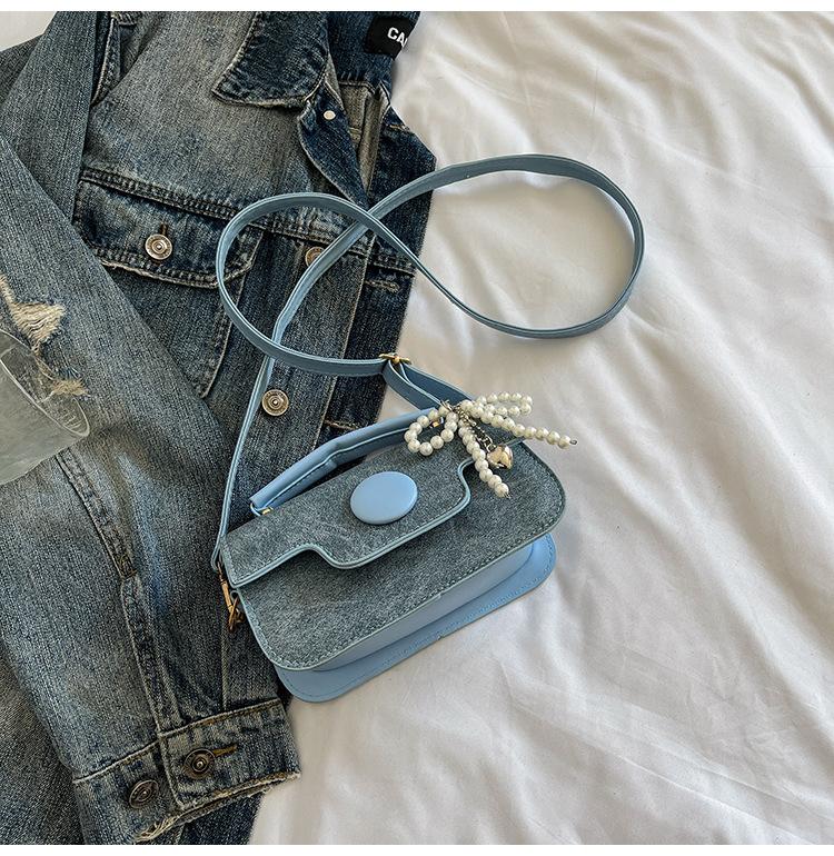 

Niche texture mini bag women s 2025 new shoulder messenger bag, high-end versatile ins pearl small square bag