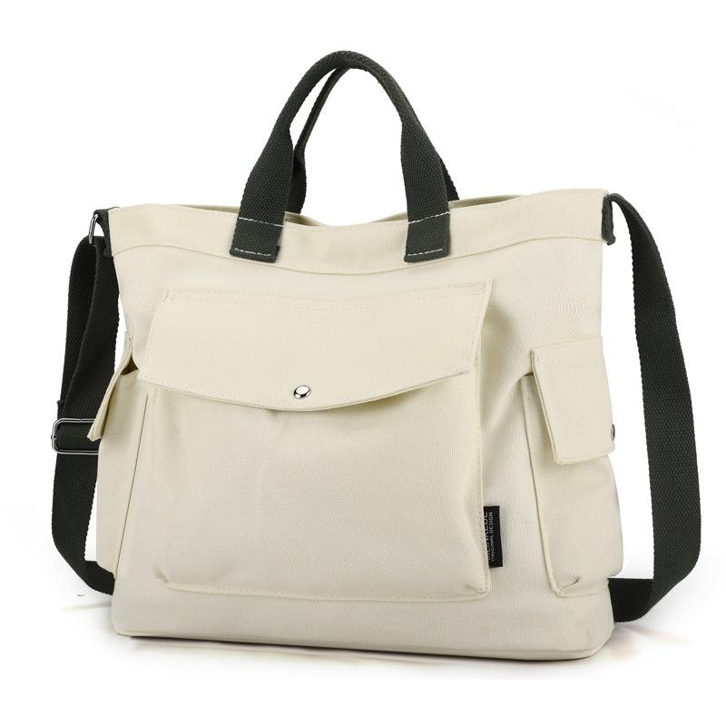 New Canvas Handheld Women's Bag 2025 Large Capacity Solid Color Canvas Commuting and Leisure Shoulder Korean Version Tote Bag