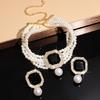 Moderne Kunst Geïnspireerd Meerlaags Imitatie Parels Ketting En Luxe Bijpassende Studs Oorbellen Accessoireset