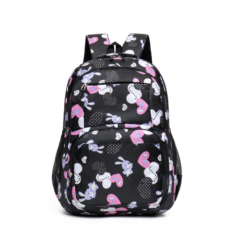 New large-capacity primary and secondary school schoolbag-grade women's high-quality ridge protection wind light backpack
