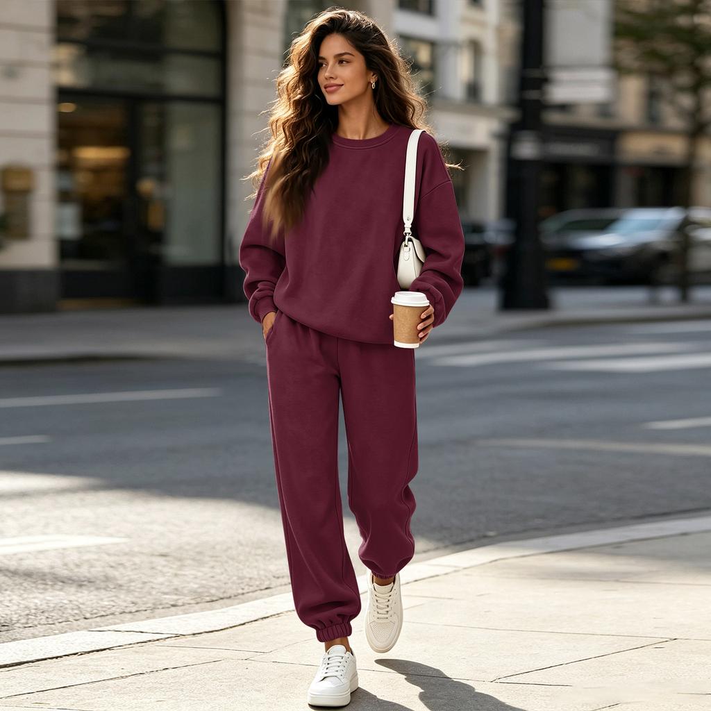 Completo da ginnastica da donna a 2 pezzi con pantaloni a gamba larga per un uso casual quotidiano