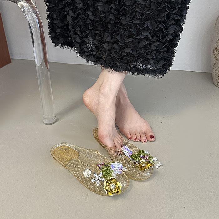 Strandgeléskor fevind ihåliga platta kristallprinsesskor mjuk sula en pedal mode sandaler blomma regnskor