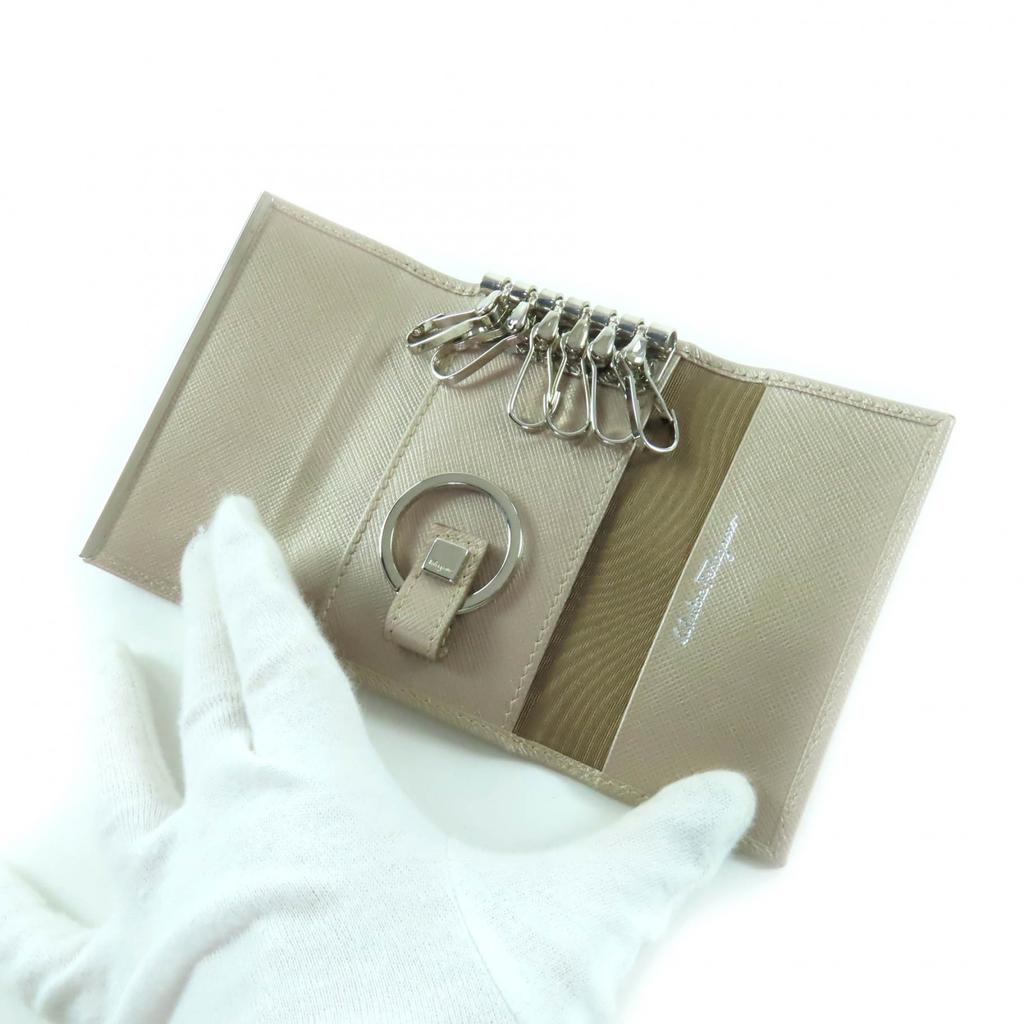 Excellent Porte-clés Salvatore Ferragamo Cuir Doré Champagne Femme 224627 Occasion