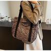 Leopard Print Canvas Tote: Large Capacity Autumn Shoulder Bag for Women, Versatile for College and Commute.