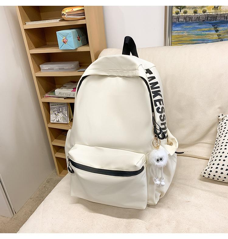School bag solid color letter fashion backpack Korean version college student lightweight school bag outdoor travel large capacity backpack