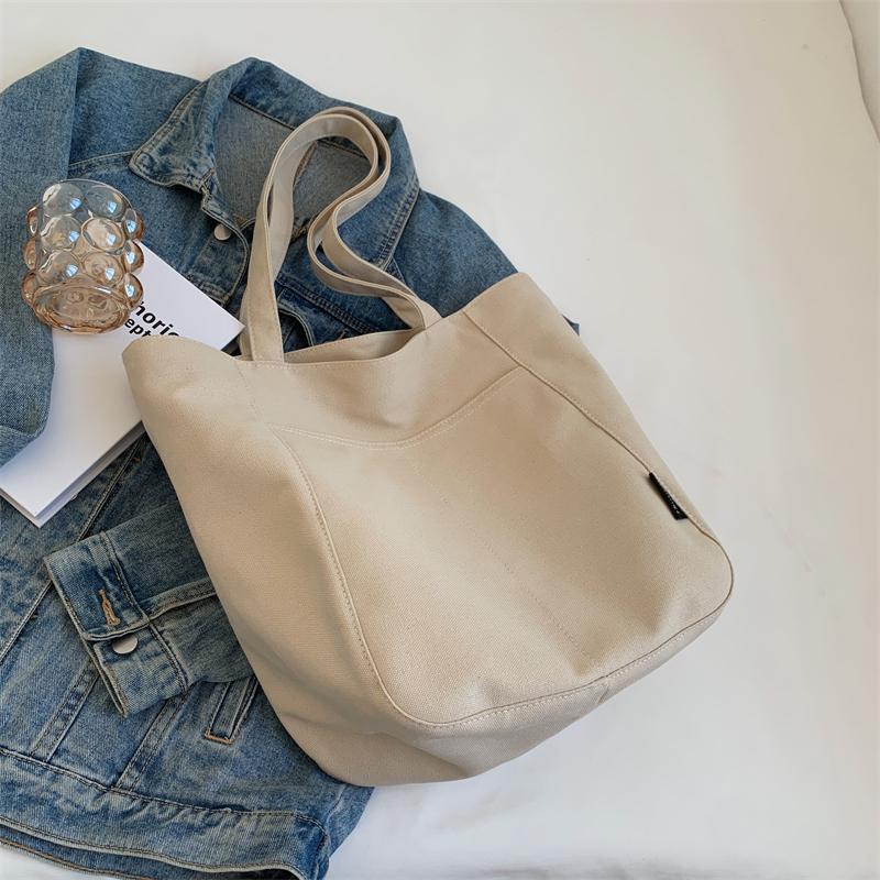 2026 Women's Large Capacity Canvas Tote Bag - Versatile Single Shoulder Bag for Autumn/Winter Commute and College.