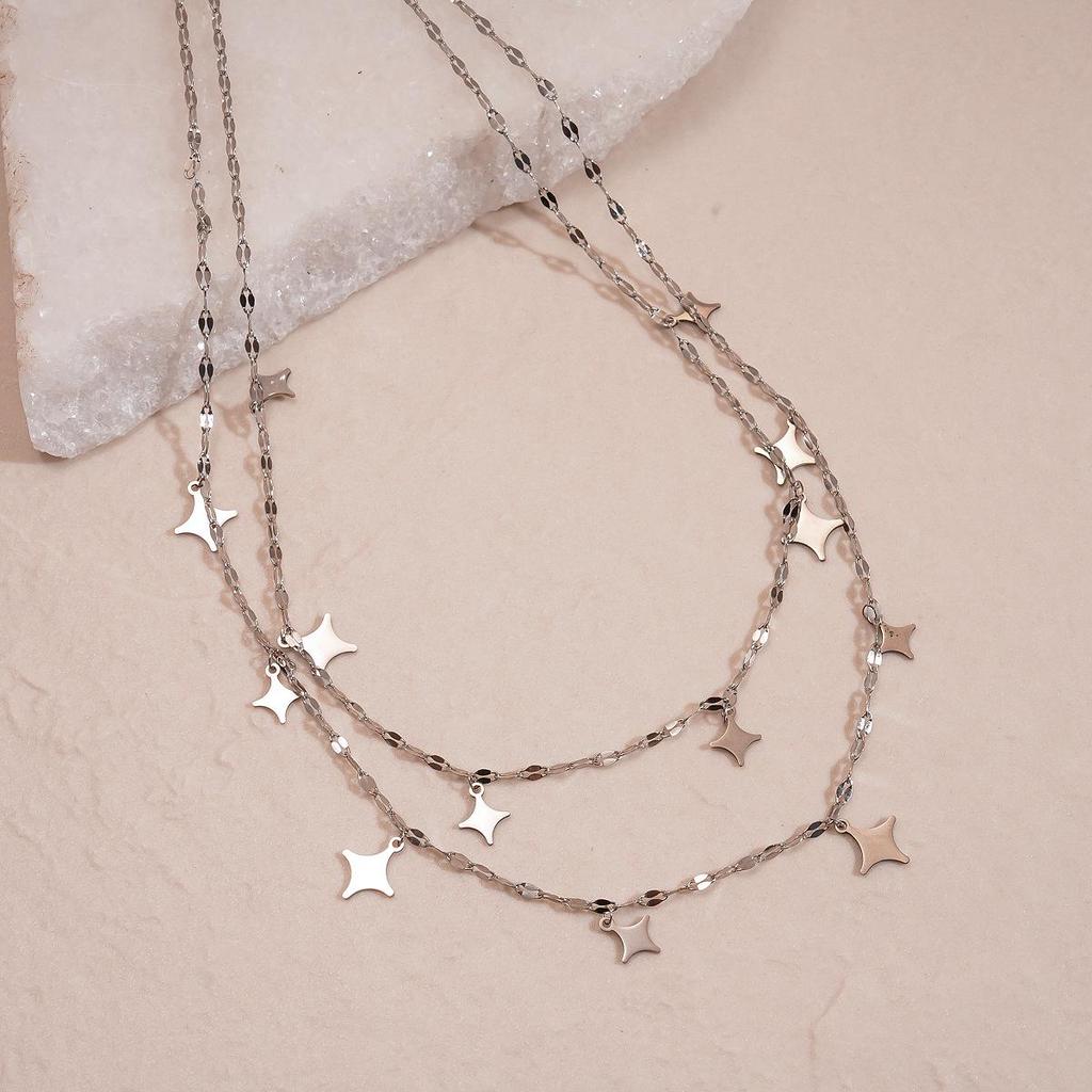 Light Luxury Stainless Steel Starburst Tassel Necklace: High-End Double Layer Clavicle Chain for Women's Fashion