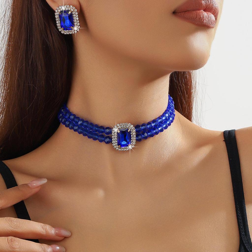 Luxuriöse doppellagige geometrische Kristallkette und rechteckiges Ohrstecker-Set