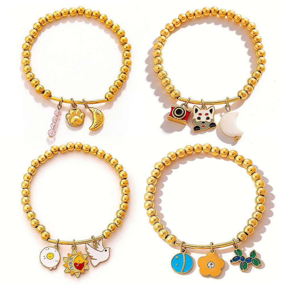 Seaside vacation wind cartoon bear flower DIY multi-pendant gold beaded bracelet summer versatile jewelry