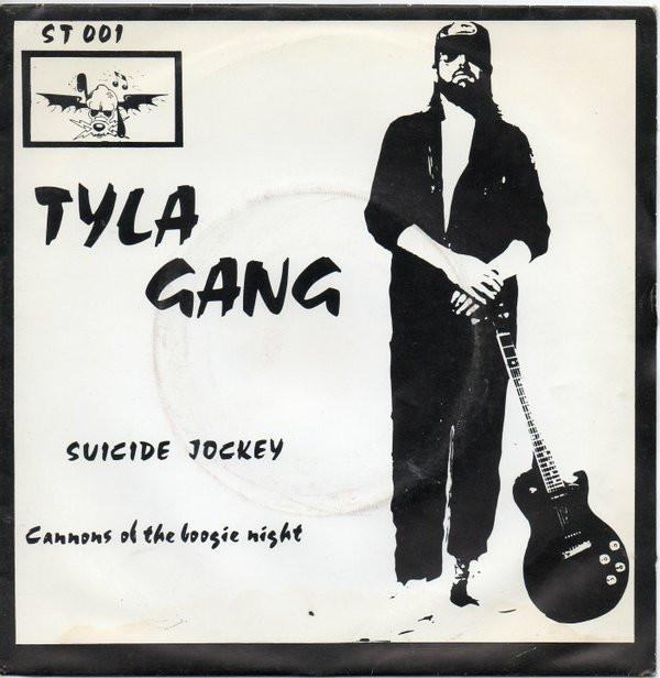 

7-дюймовая пластинка TYLA GANG - Suicide Jockey ST001 Skydog 1977 UK Рок Б/У