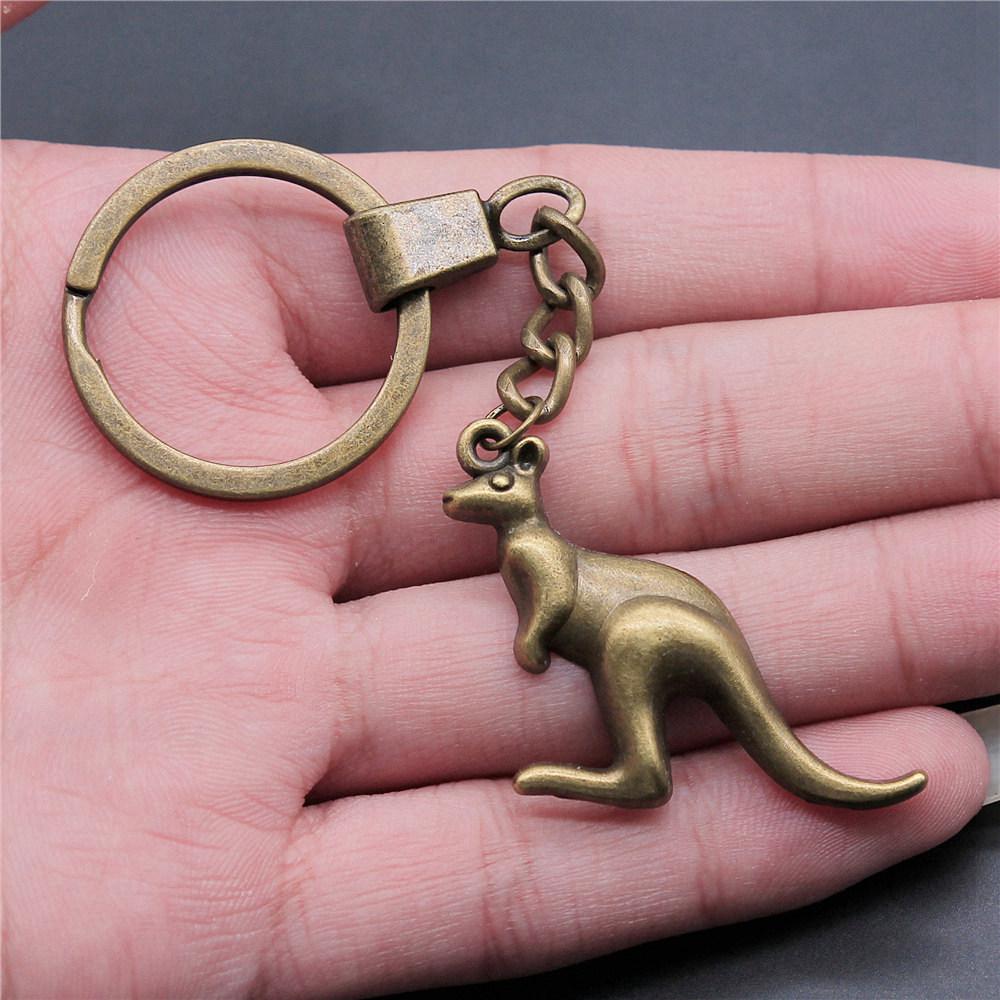 Dinosaur Animal Prehistoric Creature Pendant Antique Bronze Metal Keychain with 30mm Ring for Women High Quality
