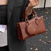 High-end handheld small square bag women's 2025 new retro fashion shoulder bag niche design commuter crossbody bag for women