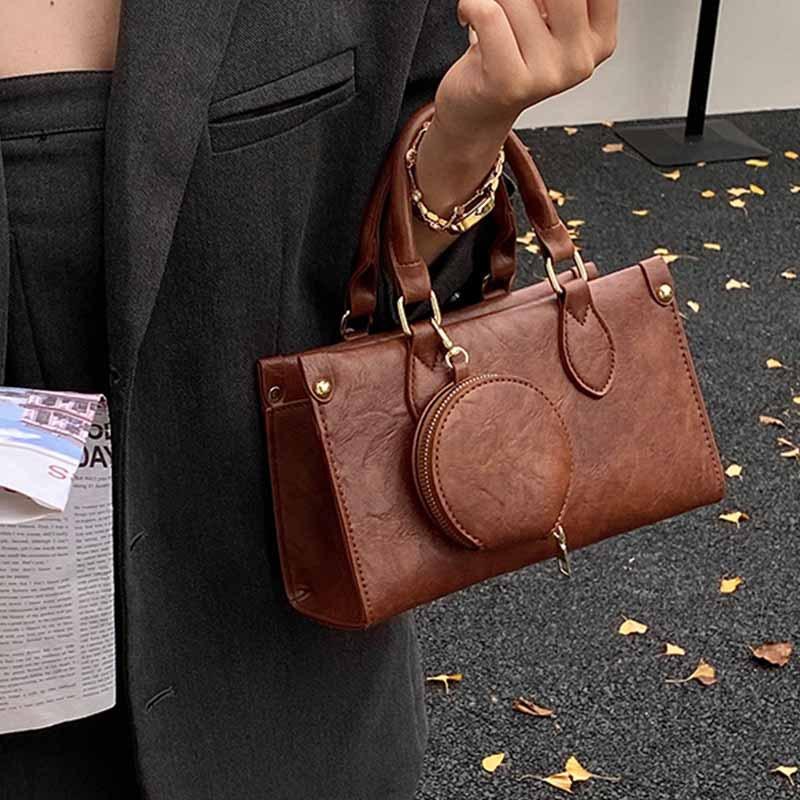 High-end handheld small square bag women's 2025 new retro fashion shoulder bag niche design commuter crossbody bag for women