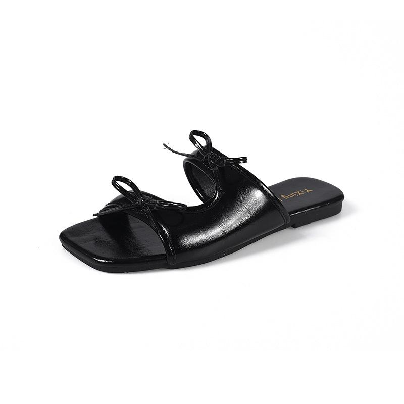 

Супер красивые крутые шлепанцы на низком каблуке для женской летней носки, новые с юбкой однословные плоские сандалии 40 чёрный