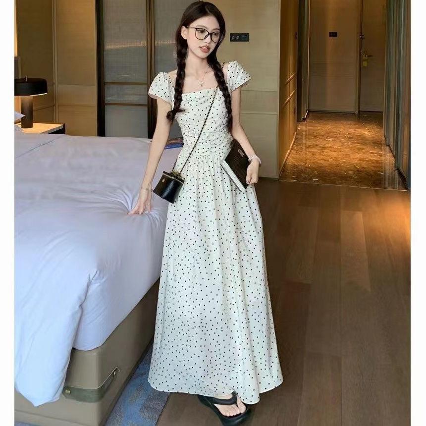 French niche Feifei sleeve polka dot dress women's design sense age-reducing A-shaped skirt slim temperament gentle wind long dress