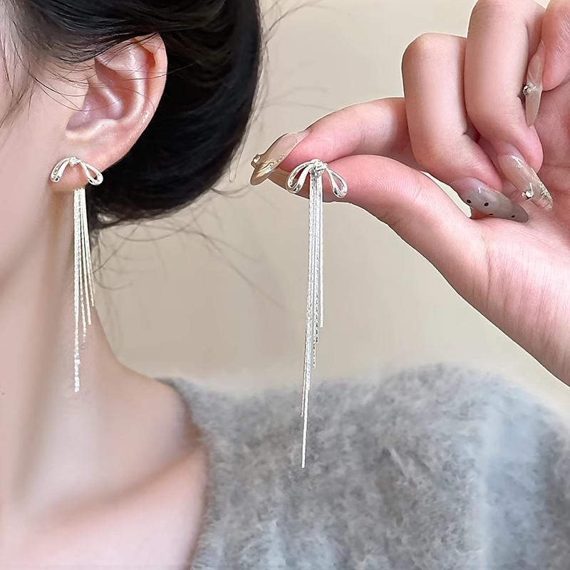 

Шикарные двухсторонние серьги-кисточки в форме банта: Универсальный и элегантный A2164 серебряный