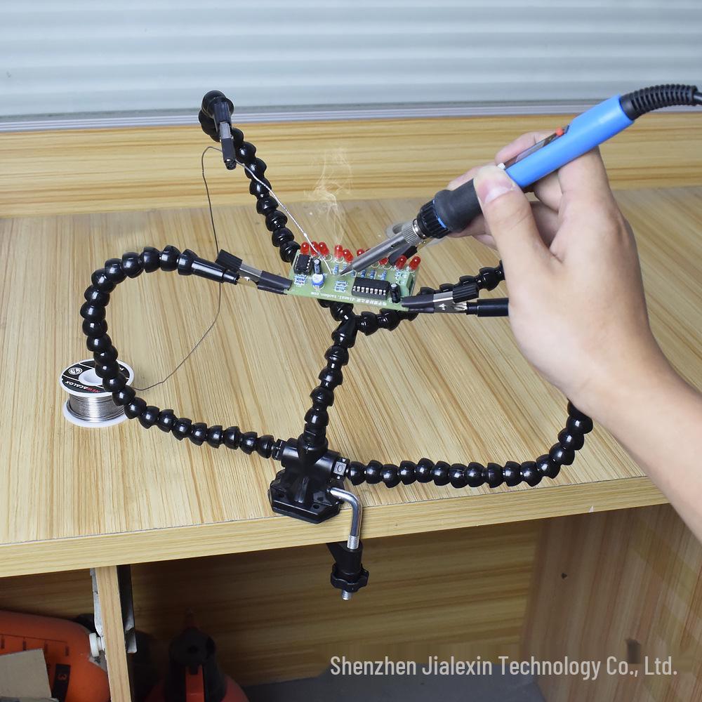 Four-Jaw Soldering Station with Flexible Arm and PCB Holder for Multifunctional Welding and Model Repair.