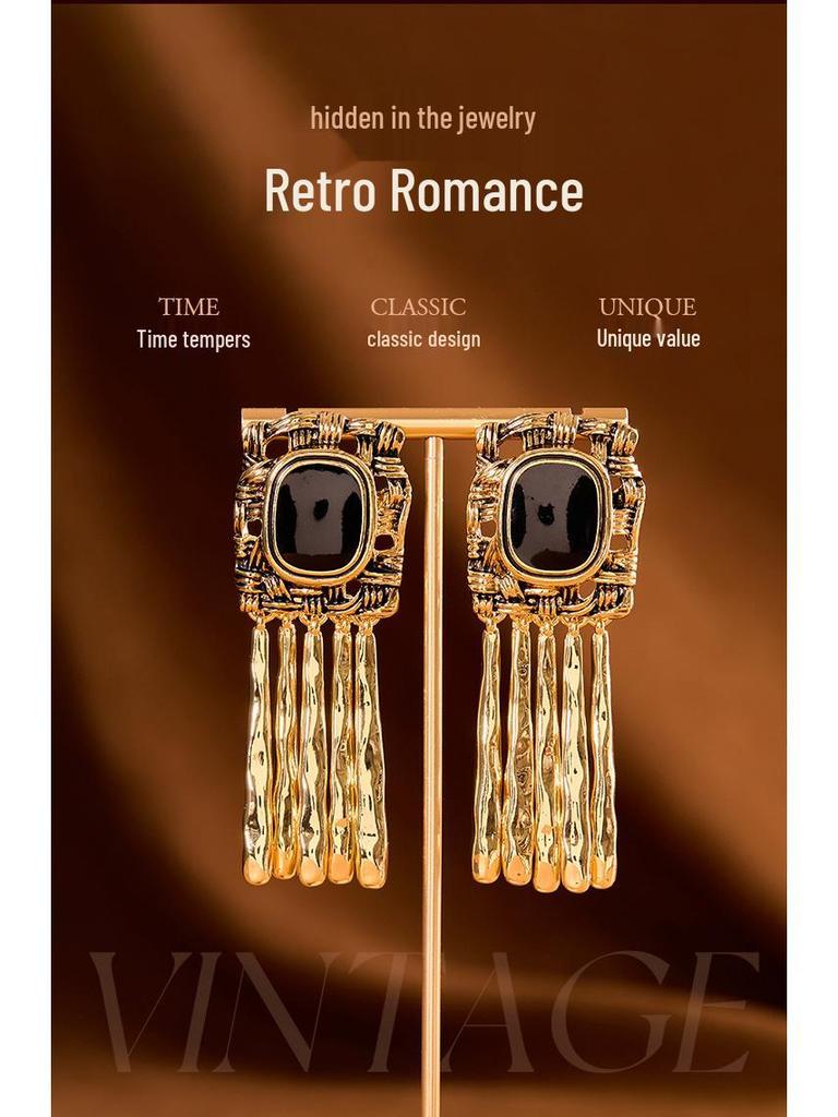 Pre-owned Black Gold Tassel Earrings with Woven Texture and Black Gemstone Embellishment.