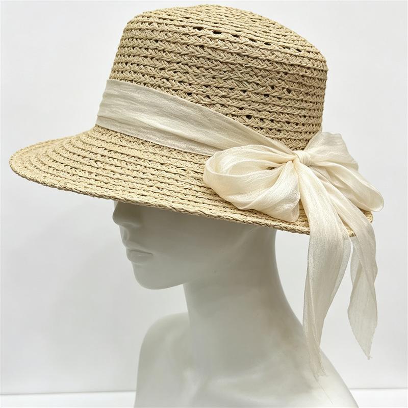 Hollow raffia simple webbing bow flat top hat women's summer elegant versatile sunscreen straw hat vacation beach hat