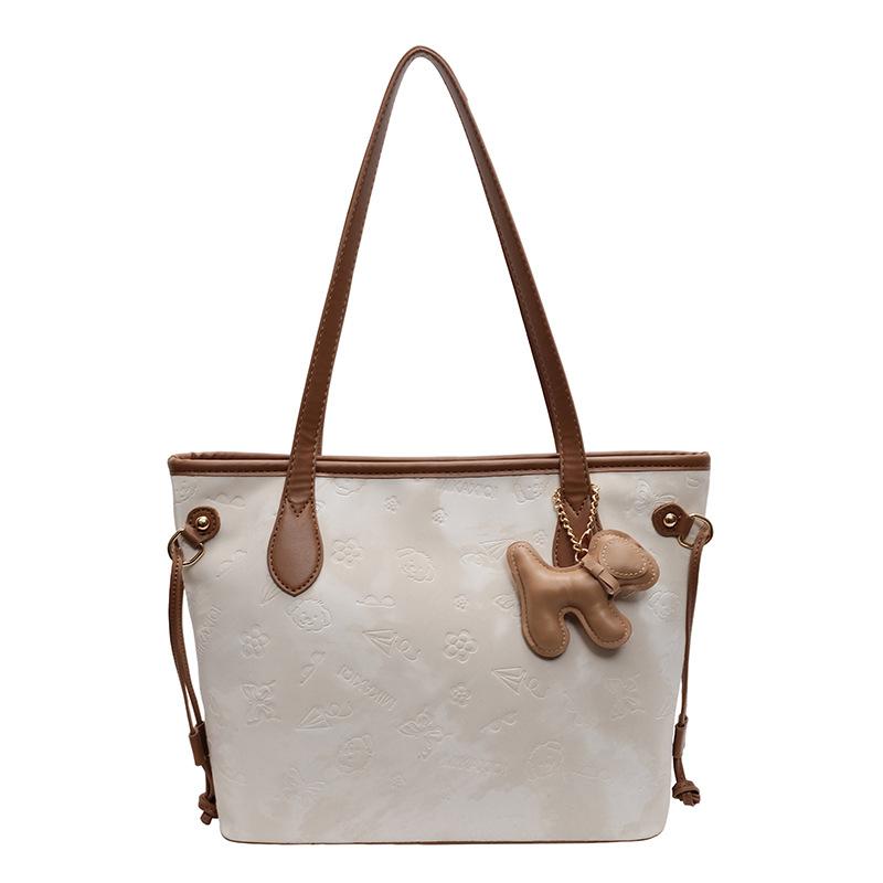 Frühlingsneues Produkt, niedliche geprägte Tragetasche, Studenten-Pendler-Nische, Damen-Schultertasche mit großem Fassungsvermögen
