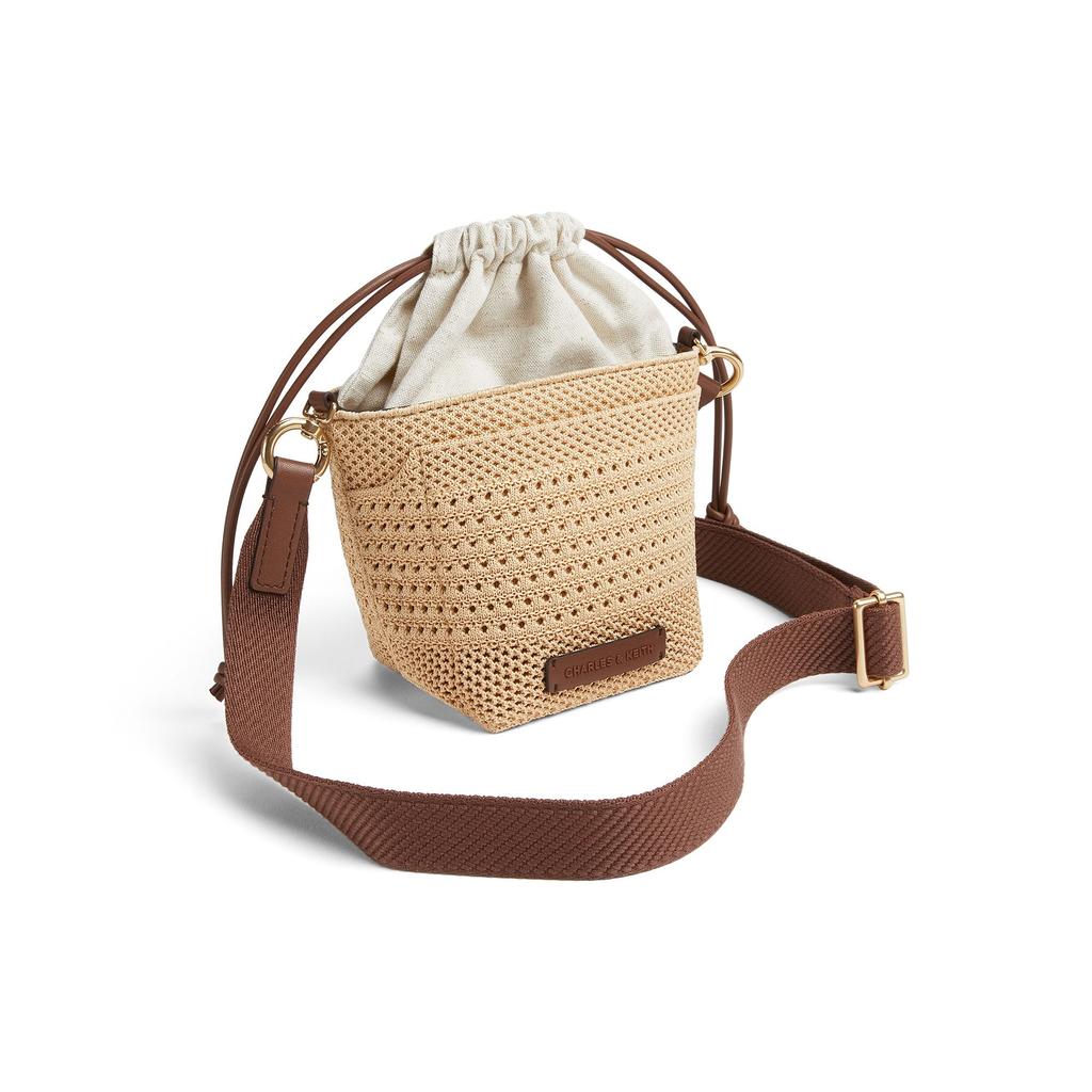 Charles & Keith Dopamine Woven Series Hollow Weave Drawstring Bucket Bag Women crossbody bag Multi-color CK11-10782618