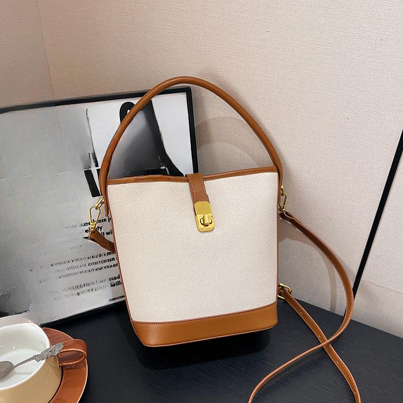 Ein-Schulter-Tasche Modische Patchwork-Bucket-Bag Nischendesign Handheld Crossbody-Tasche