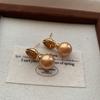Water drop shape orange gemstone pearl earrings earrings are elegant and exquisite, niche fashion design, high-end sense, light luxury and versatile
