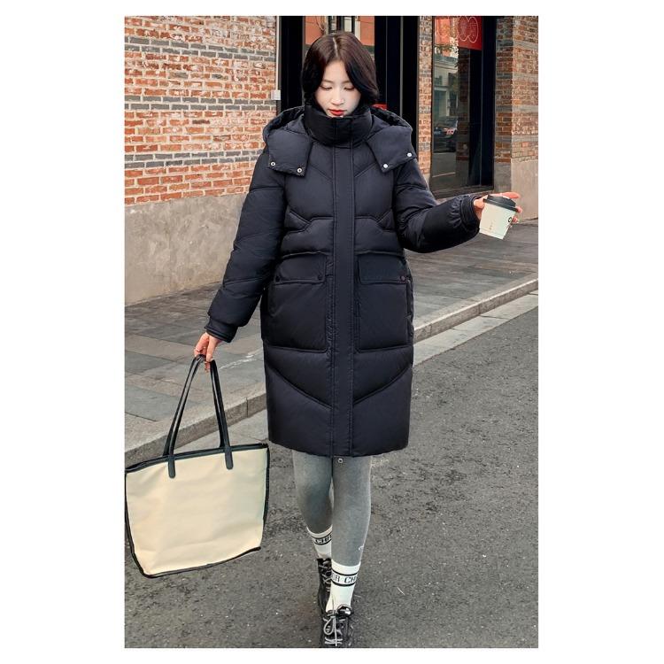 Μείνετε ζεστή και κομψή τον χειμώνα με αυτό το γυναικείο παλτό με κουκούλα μεσαίου μήκους σε κορεατικό στυλ.