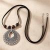 Cross-Ethnic Retro Long Sweater Chain with Black Leather Rope and Tribal Pendant - Women's Necklace