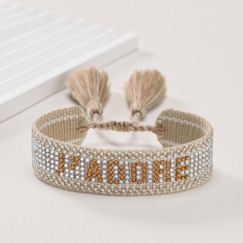 Unisex European Handwoven Tassel Bracelet with Hot-drilled Letter Design