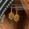 Retro ethnic style round hollow earrings Bohemian temperament elegant earrings niche fashion light luxury earrings women