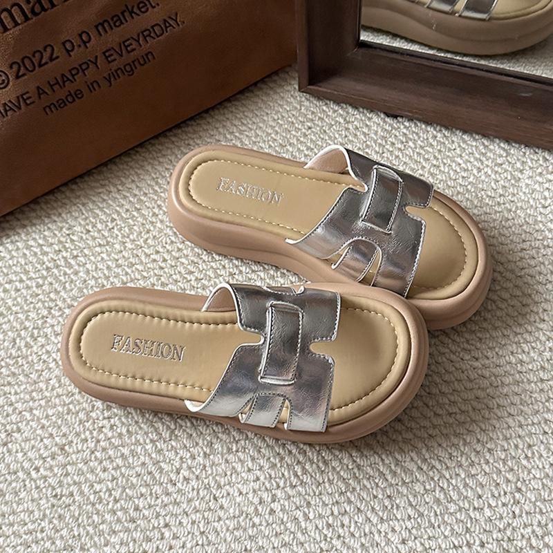 Woven thick-soled one-word slippers for women's summer wear new fashionable and versatile skirts, beach cool slippers