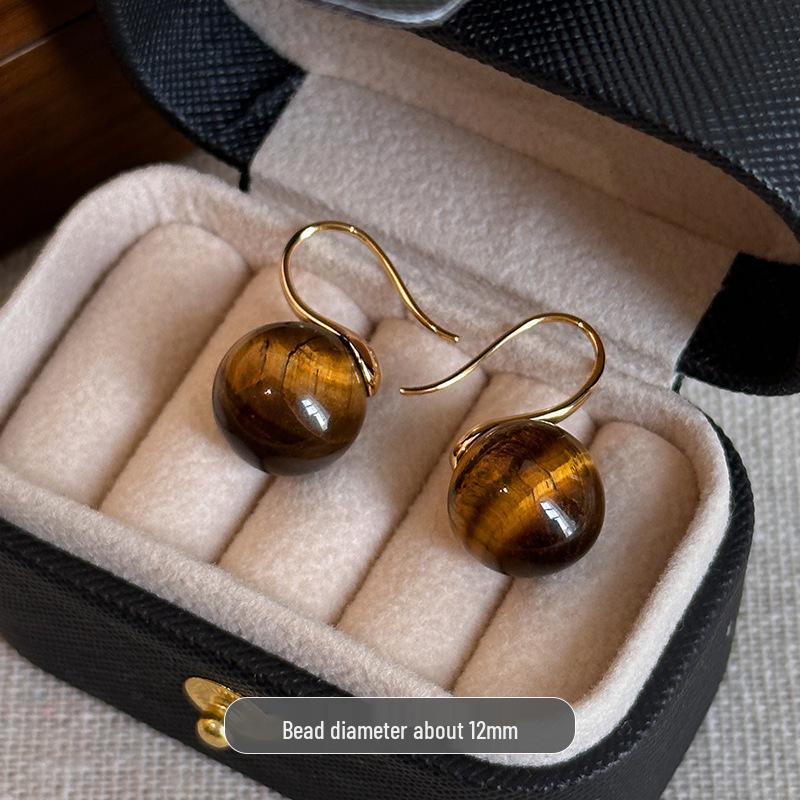 

2025 Осень/Зима Женские Высококлассные Простые Серьги: Универсальный дизайн с системой цветов Майяра