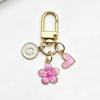 A-Z Letter Charm Enamel Keychain Pink Cherry Blossom Heart Design Key Ring for Graduation Souvenir Gift