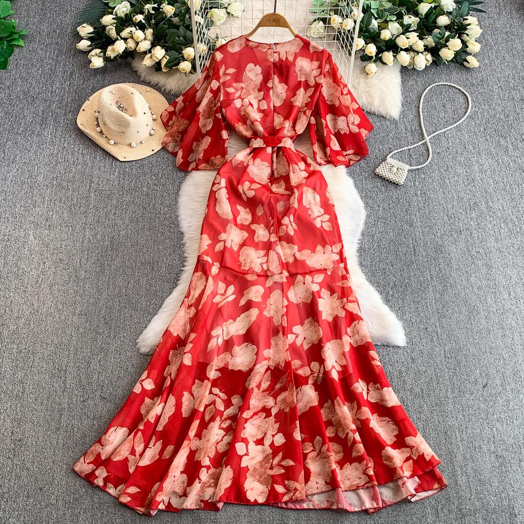 French holiday style beautiful fairy gas printing V-neck dress women's autumn and winter waist irregular elegant ruffle skirt
