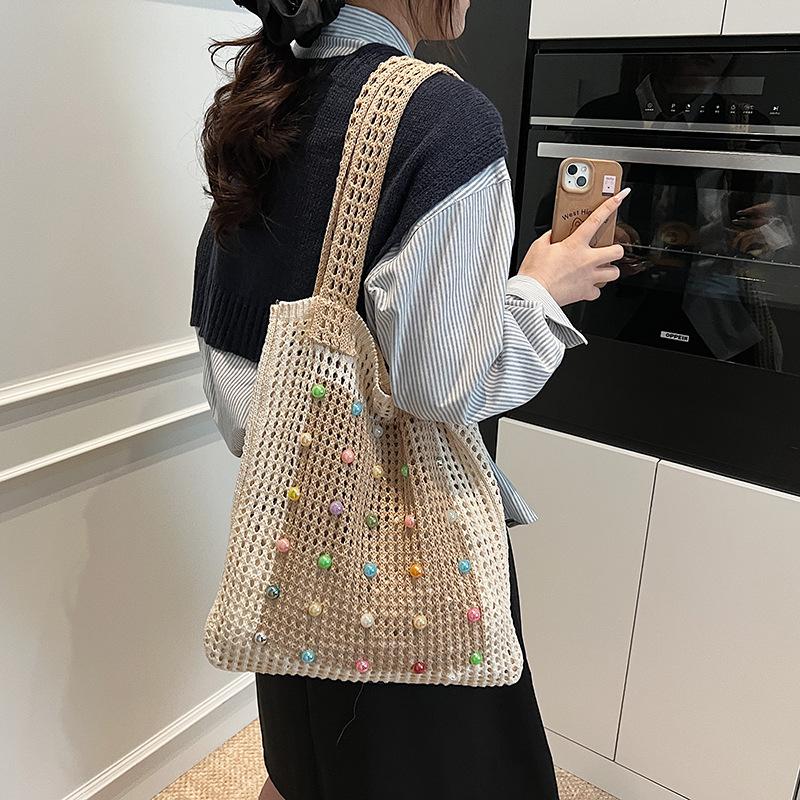 Large Capacity Hollow Knitted Bag Women's New Spring and Summer Lazy Wind Shoulder Bag Seaside Vacation Water Beach