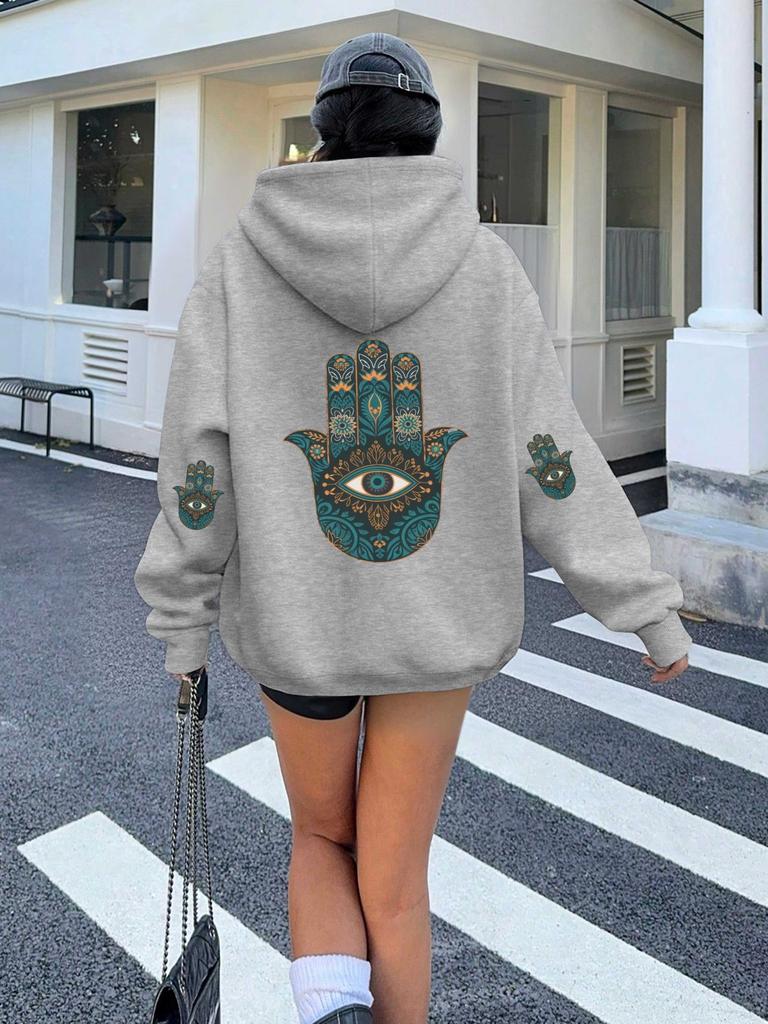 Hamsa hand with eye motif women's hoodies