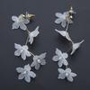 Fashion Trend White Acrylic Flower Drop Earrings Female Alloy Tassel Chain Pendant Earrings Korean Wedding Earrings