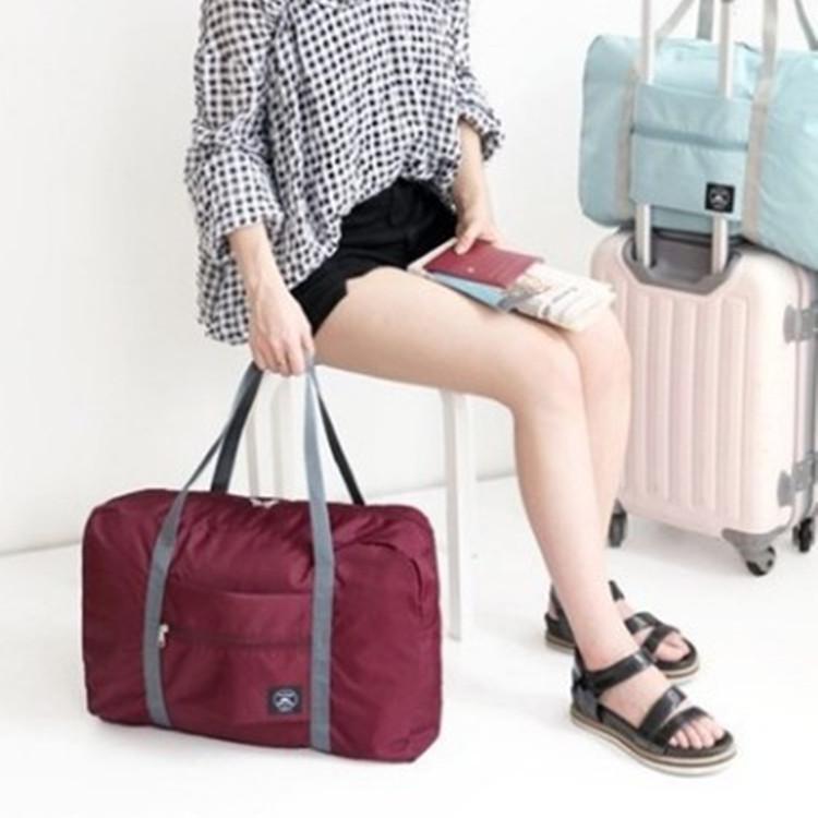 High-Capacity Foldable Travel Bag with Wheels and Logo