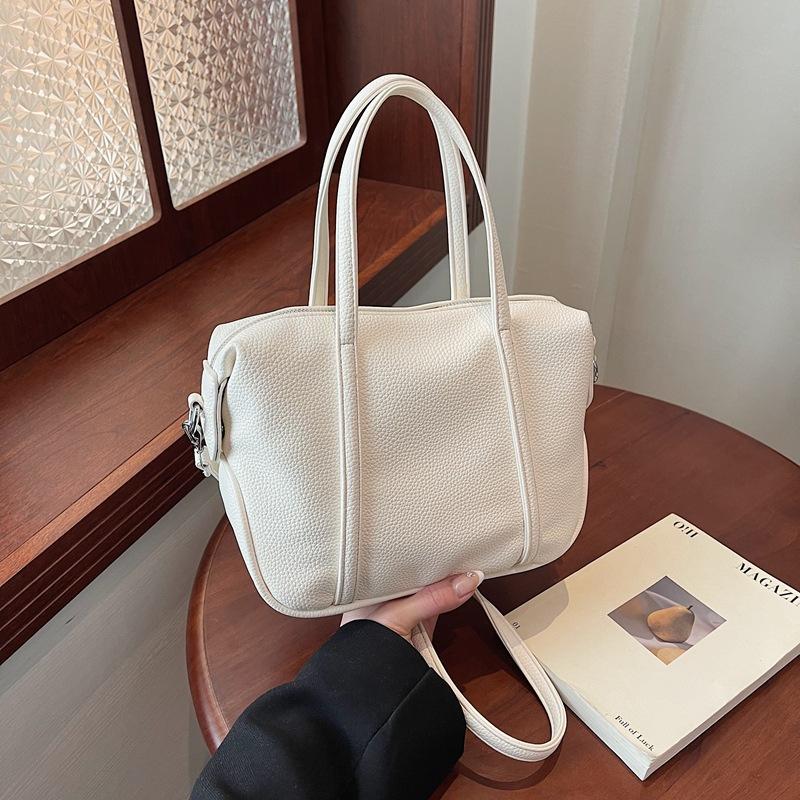 Korean version of fashionable portable women's bag 2025 new solid color simple small square bag versatile shoulder messenger bag