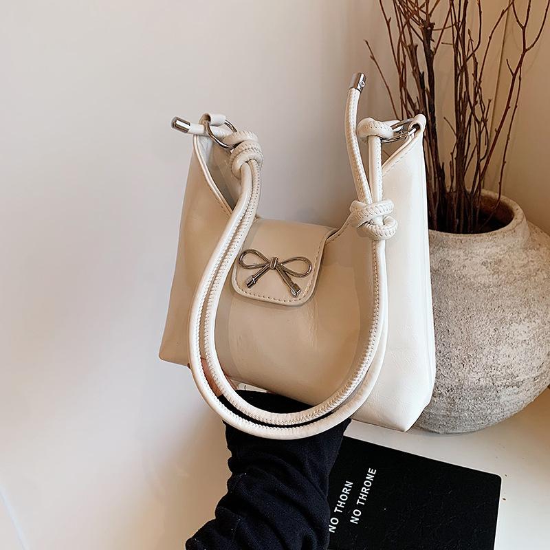 

Портативная модная сумка-тоут корейская сумка на плечо ins 2025 лето зарубежный стиль милый бант простая сумка-мессенджер белый