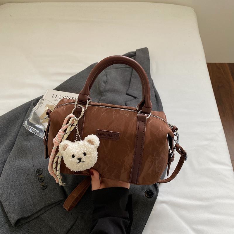 

Niche new fashionable solid color large capacity casual simple shoulder messenger bag handbag pillow bag темно-коричневого