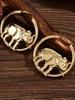 Stylish European-American Elephant Hollow Metal Earrings