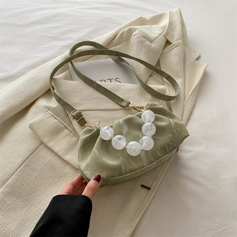 Chic And Versatile Bucket Style Cloud Handbag For Women Featuring Unique Stitching Design