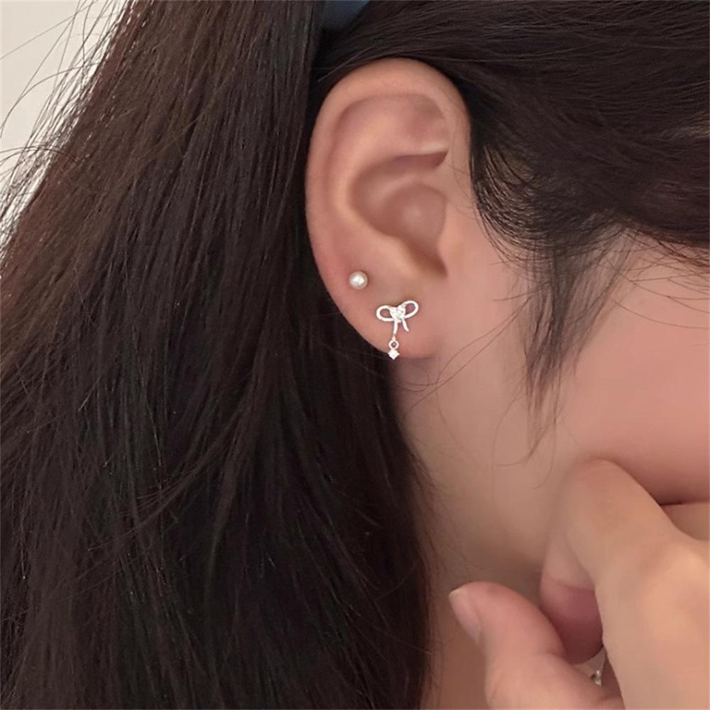 Korean version of exquisite bow stud earrings, ear holes, small love zircon earrings, earrings.