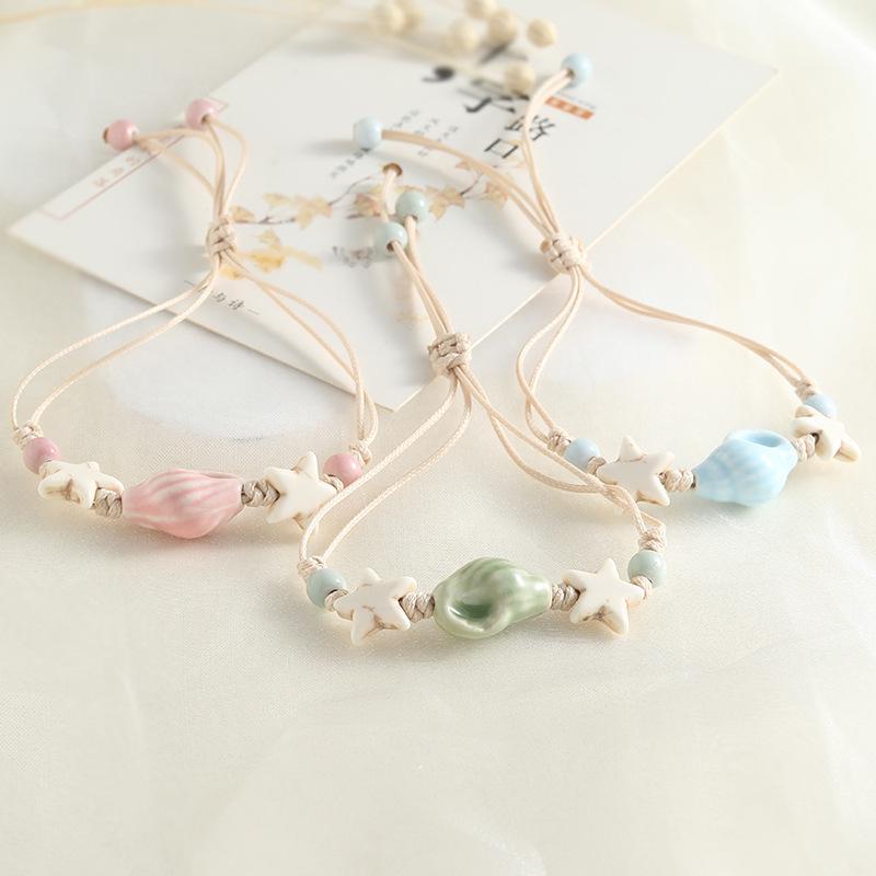 Jingdezhen Keramik Perlenarmband - Handgewebtes Porzellan mit Muschelakzenten