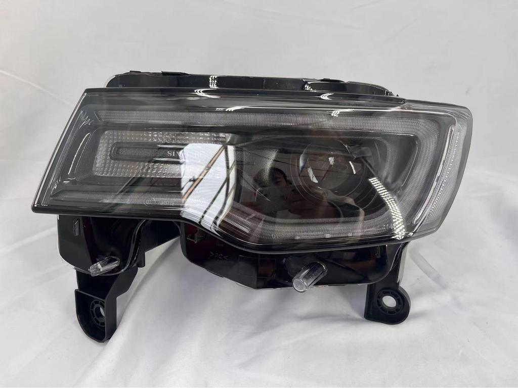 Fits 2014-2018 Jeep Grand Cherokee: OEM Headlight Half Assembly with Low Beam Lighting