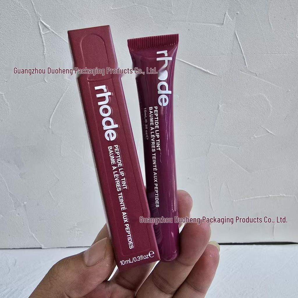 Balsam de buze hidratant și luciu de buze nuanțat Rhode Hailey